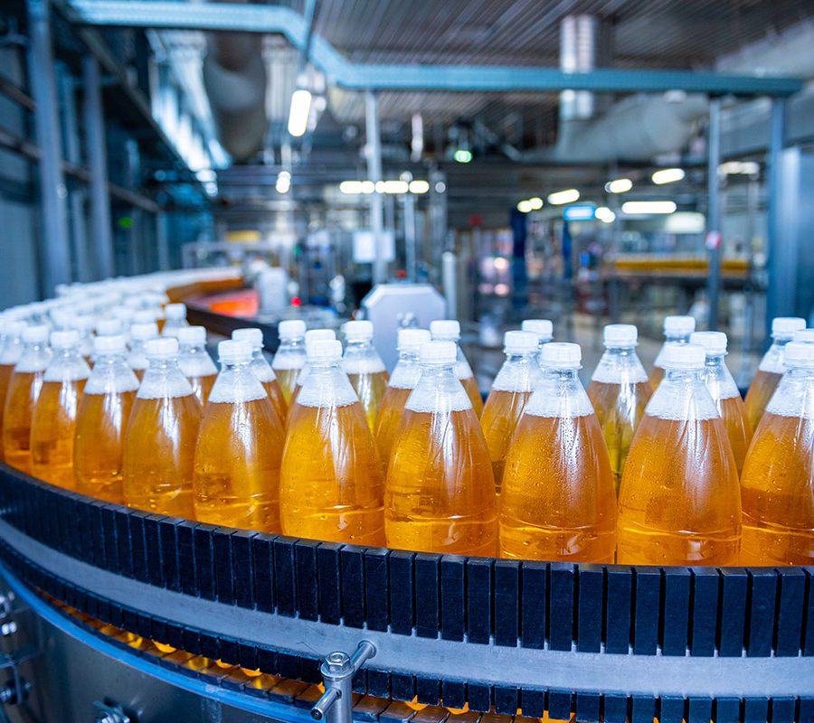 _0002_conveyor-belt-with-bottles-juice-water-modern-beverage-plant